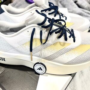 Adidas Adizero Evo SL running shoe in the Georgia Tech edition with Backpack